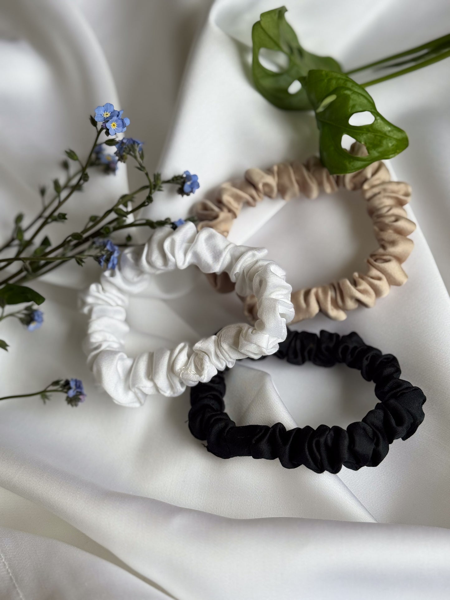 BetterBe bamboo scrunchies product flat lay, mixed colors on white surface