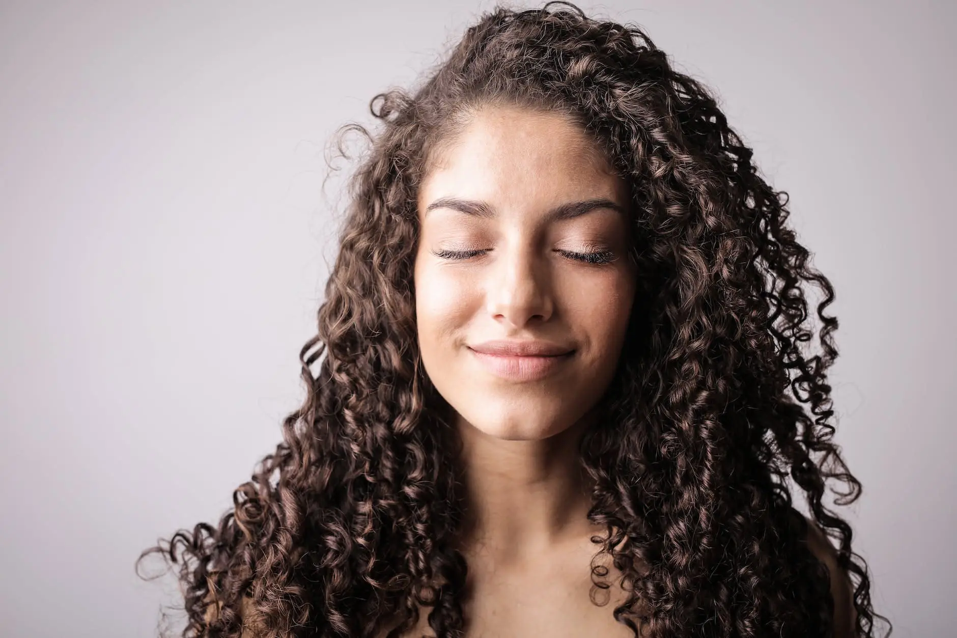 Woman with brunette curls