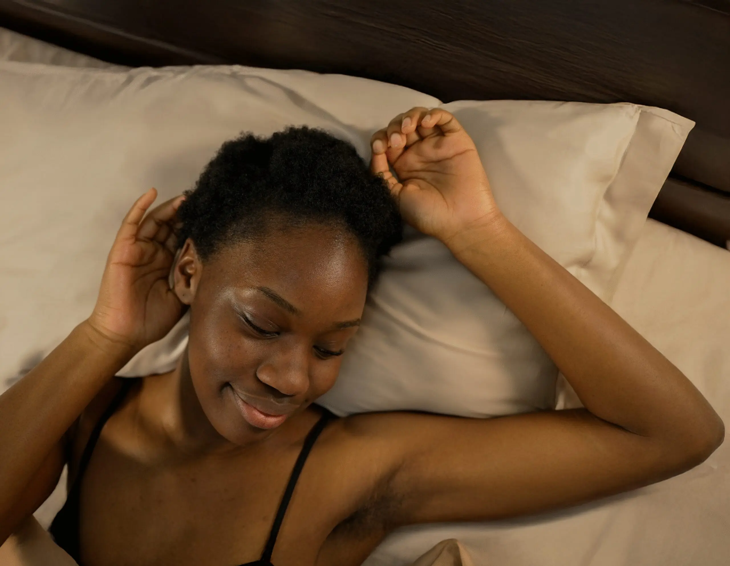 Woman laying on 100% bamboo pillowcase