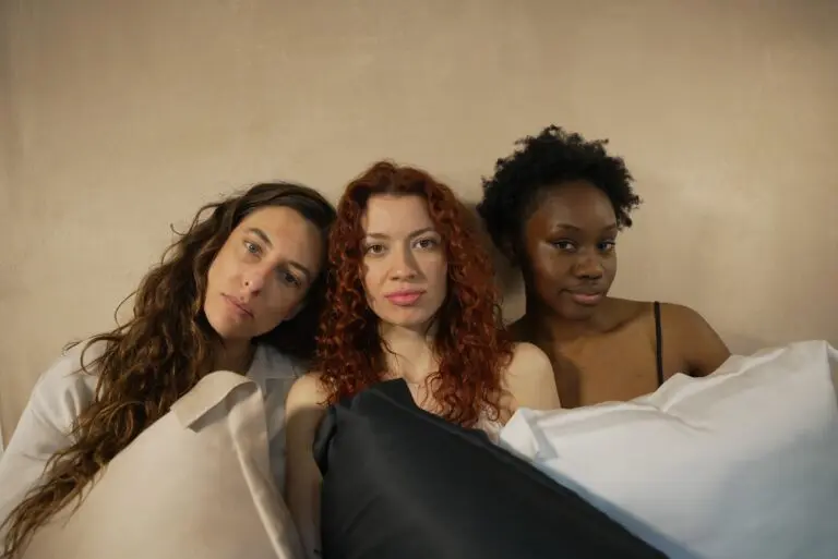100% bamboo pillowcases being hold by women