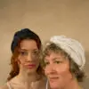 2 females wearing the 100% bamboo hair bonnet