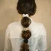 Woman wearing all 3 colours of the slim 100% bamboo scrunchie