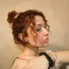 Woman with 100% bamboo scrunchies around her wrist